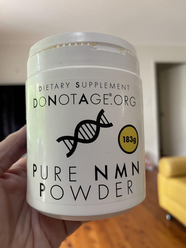 A container of DoNotAge NMN 183g powder container from my last order that I saved 10% by using the LONGEVITY FAQ Coupon Code