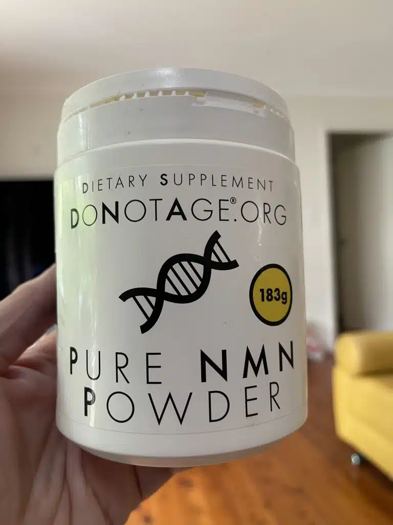 A container of DoNotAge NMN 183g powder container from my last order that I saved 10% by using the LONGEVITY FAQ Coupon Code